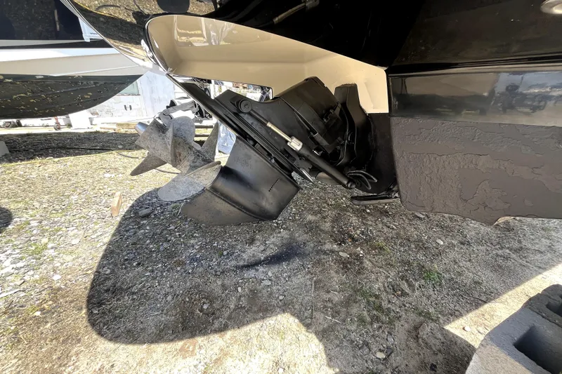 Slide: The Image of 2011 Monterey 254FSC boat propeller and stern drive on dry land. - 7