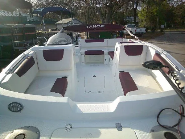 Slide: The Image of 2019 Tahoe 1950 Deck boat with spacious interior and seating. - 9