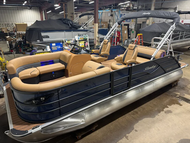 The Image of 2026 Bentley Pontoons Legacy 223 Tritoon in showroom. - 1