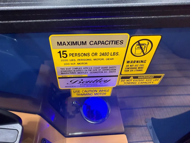 Slide: The Image of Safety label on Bentley Pontoons Legacy 223 Swingback Tritoon. - 15