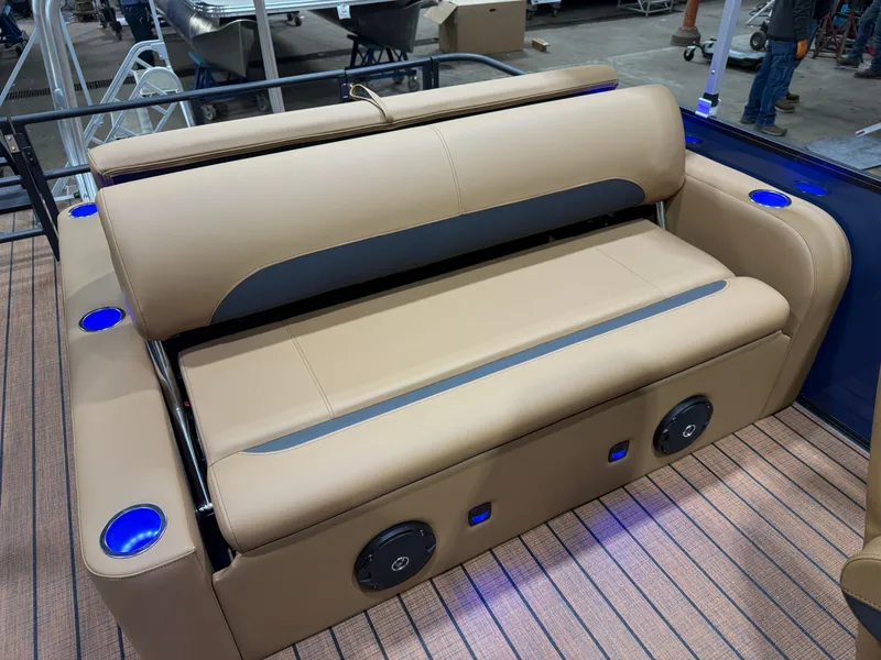 Slide: The Image of 2026 Bentley Pontoons Legacy 223 Swingback seating area with blue lighting. - 16