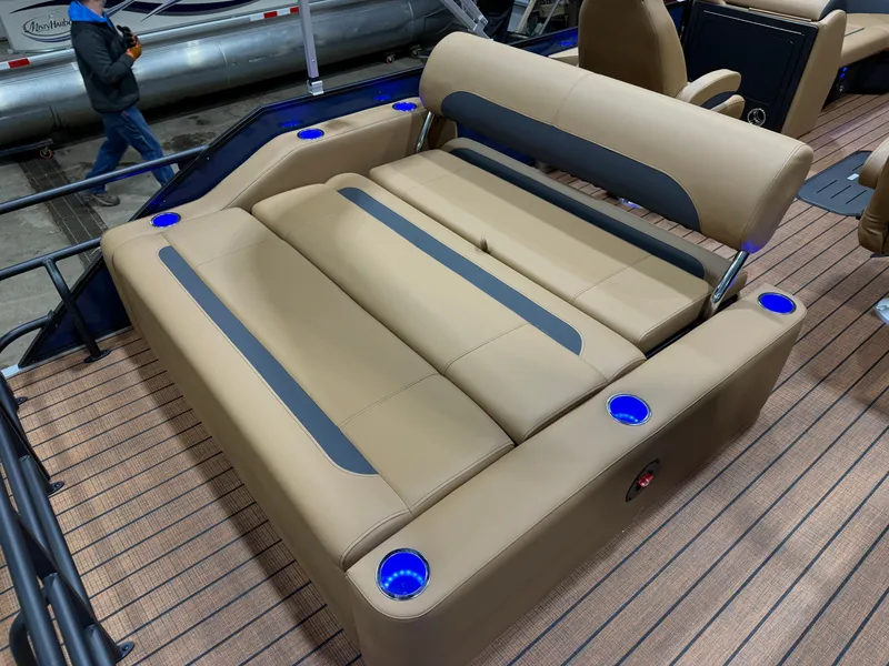 Slide: The Image of 2026 Bentley Pontoons Legacy 223 Swingback Tritoon interior with beige seating. - 18