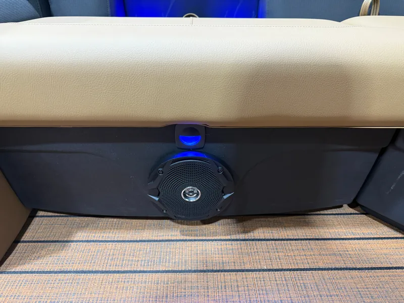 Slide: The Image of 2026 Bentley Pontoons Legacy 223 interior with speaker and blue lighting. - 37