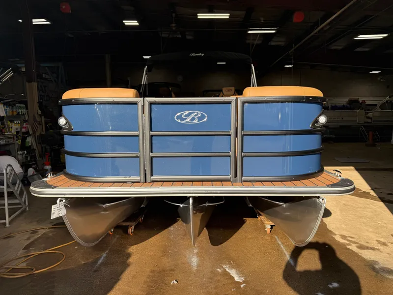 Slide: The Image of 2026 Bentley Pontoons Legacy 223 Tritoon in a workshop. - 39