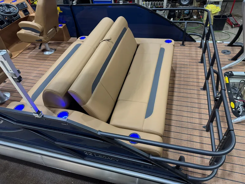 Slide: The Image of 2026 Bentley Pontoons Legacy 223 Tritoon with beige seating area. - 4