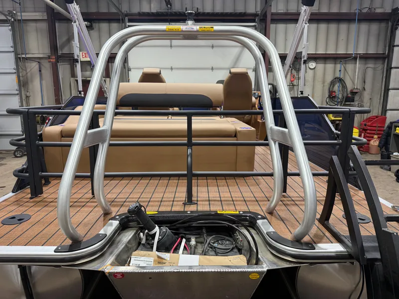 Slide: The Image of 2026 Bentley Pontoons Legacy 223 Tritoon inside a workshop. - 48