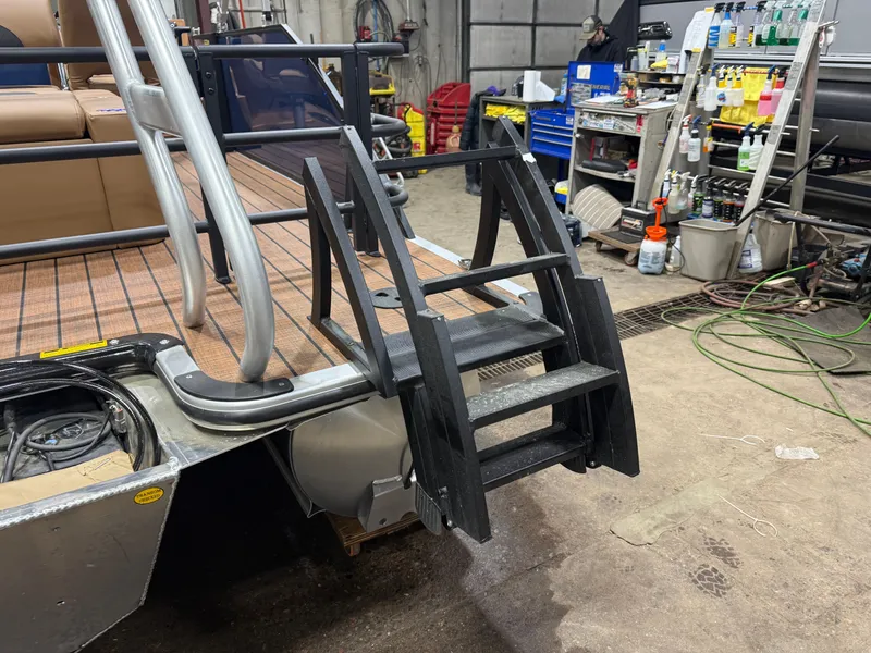 Slide: The Image of 2026 Bentley Pontoons Legacy 223 Tritoon with ladder in workshop. - 49