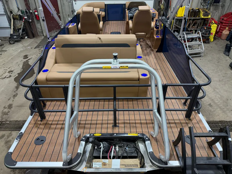 Slide: The Image of Interior view of a 2026 Bentley Pontoons Legacy 223 Swingback Tritoon. - 5
