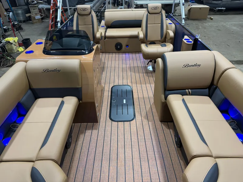 Slide: The Image of Interior of Bentley Pontoons Legacy 223 Swingback Tritoon, luxurious seating and LED lighting. - 6