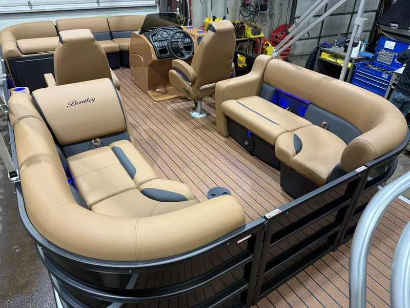 Slide: The Image of 2026 Bentley Pontoons Legacy 200 Navigator interior with luxurious seating. - 20