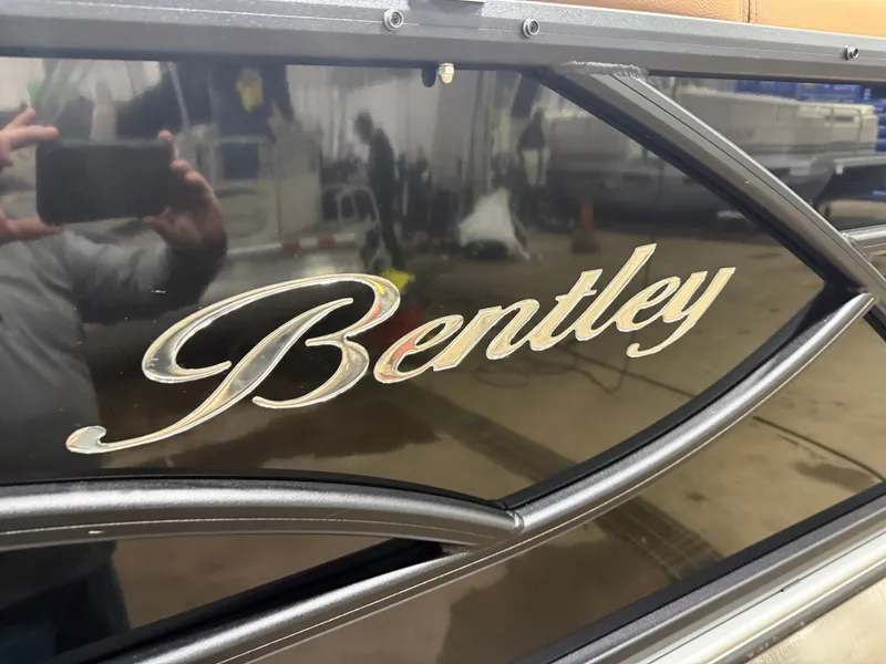 Slide: The Image of Bentley Pontoons Legacy 200 Navigator emblem close-up. - 35