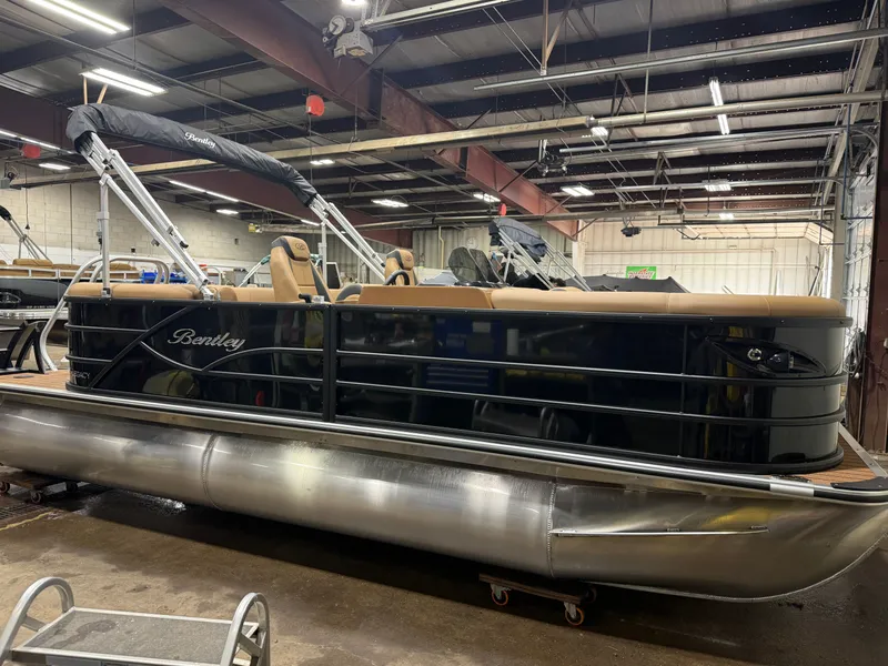 Slide: The Image of 2026 Bentley Pontoons Legacy 200 Navigator displayed indoors. - 42