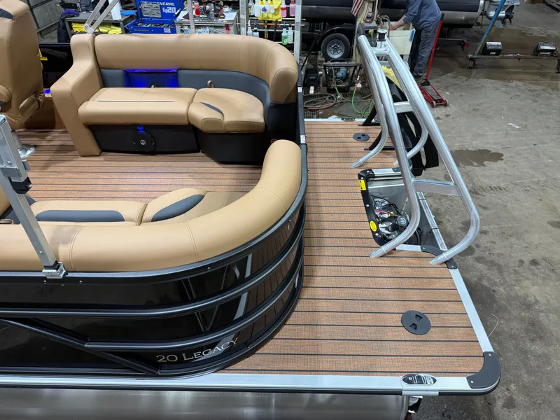 Slide: The Image of 2026 Bentley Pontoons Legacy 200 Navigator interior with quad lounge seating. - 5