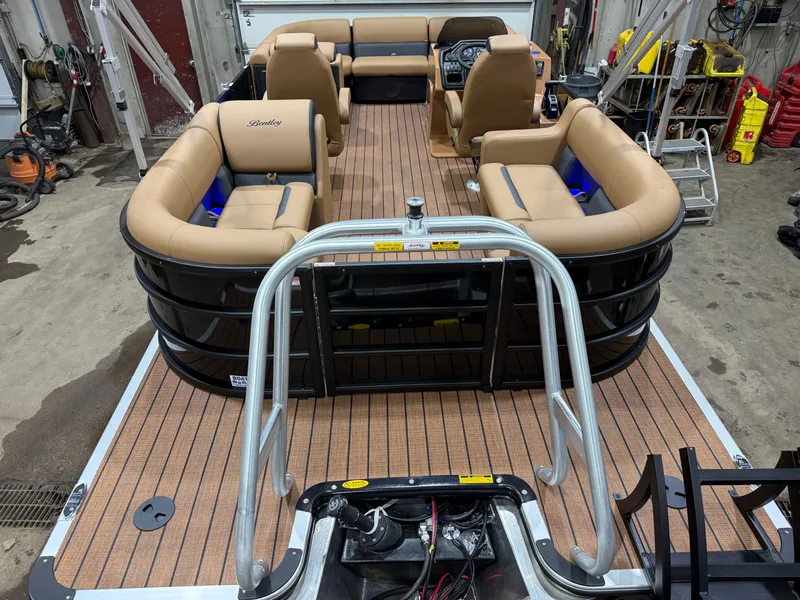Slide: The Image of 2026 Bentley Pontoons Legacy 200 Navigator with quad lounge layout. - 6