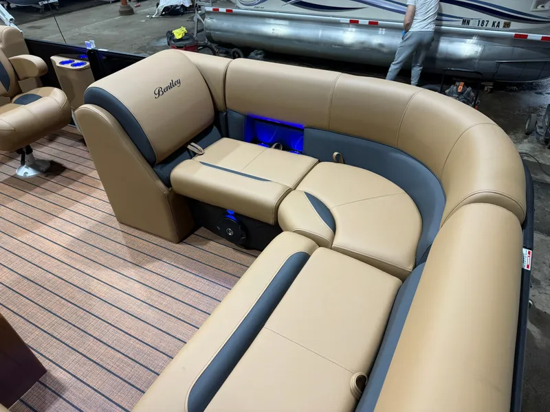 Slide: The Image of Luxurious seating in the 2026 Bentley Pontoons Legacy 200 Navigator. - 9