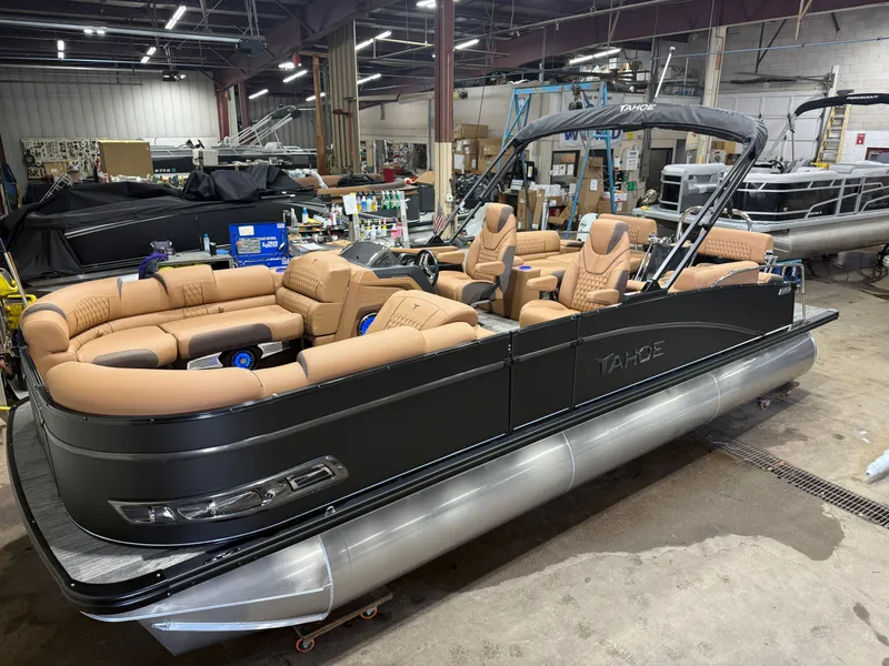 The Image of 2025 Tahoe Cascade Tritoon with luxurious interior in workshop. - 1