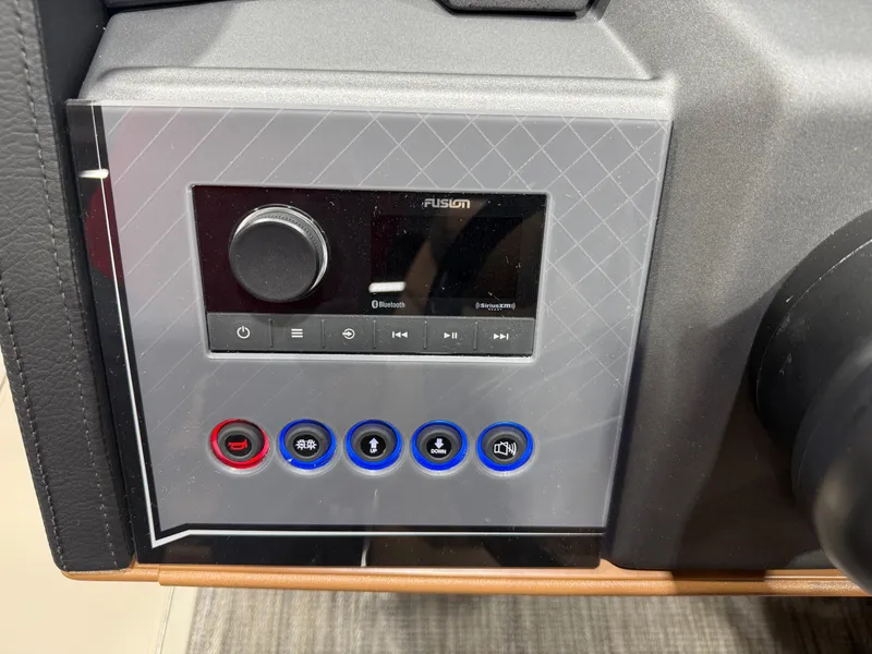 Slide: The Image of Control panel of 2025 Tahoe Cascade 2385 Tritoon with Bluetooth interface. - 14