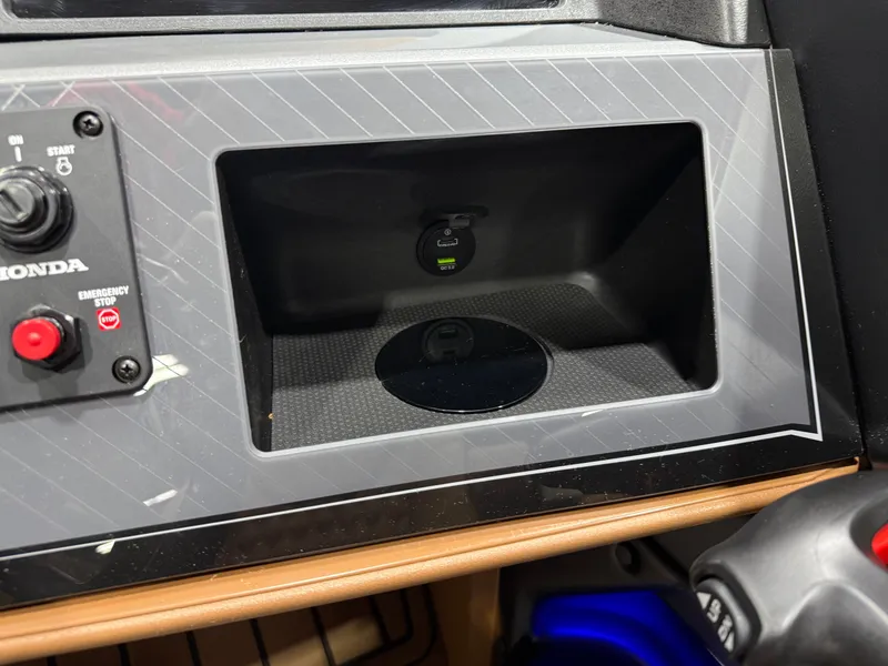 Slide: The Image of Dashboard of 2025 Tahoe Cascade 2385 Tritoon with Honda controls. - 17