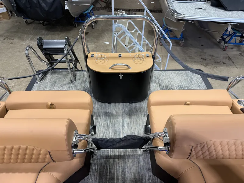 Slide: The Image of Interior view of 2025 Tahoe Cascade 2385 Tritoon with leather seating. - 23