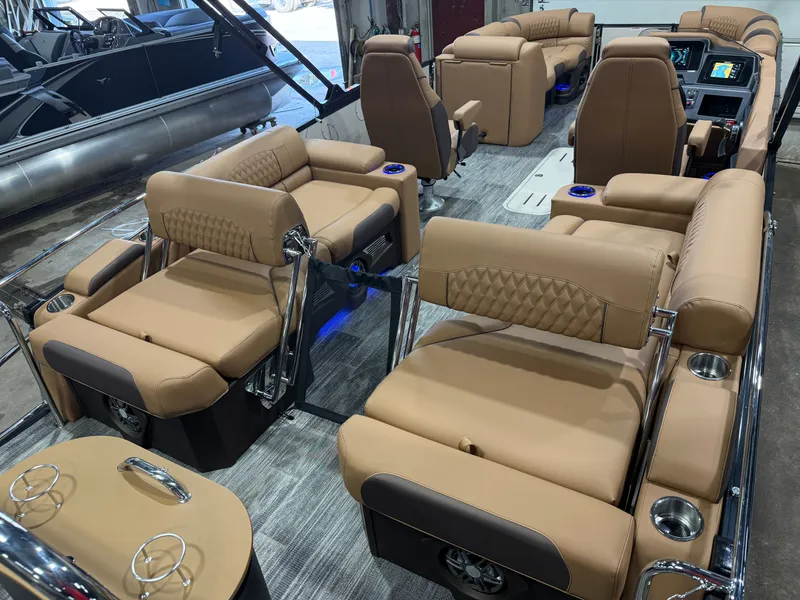 Slide: The Image of Interior of 2025 Tahoe Cascade 2385 Tritoon with luxurious seating. - 25