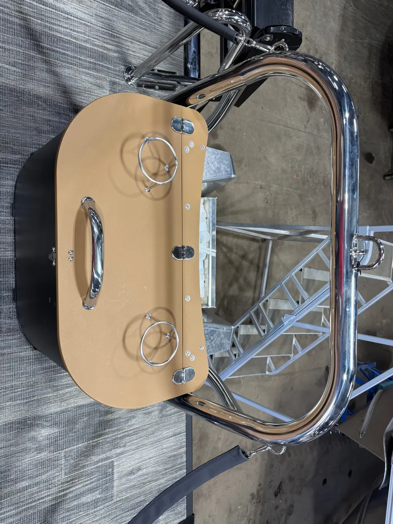 Slide: The Image of 2025 Tahoe Cascade Tritoon console with stainless steel handles. - 26