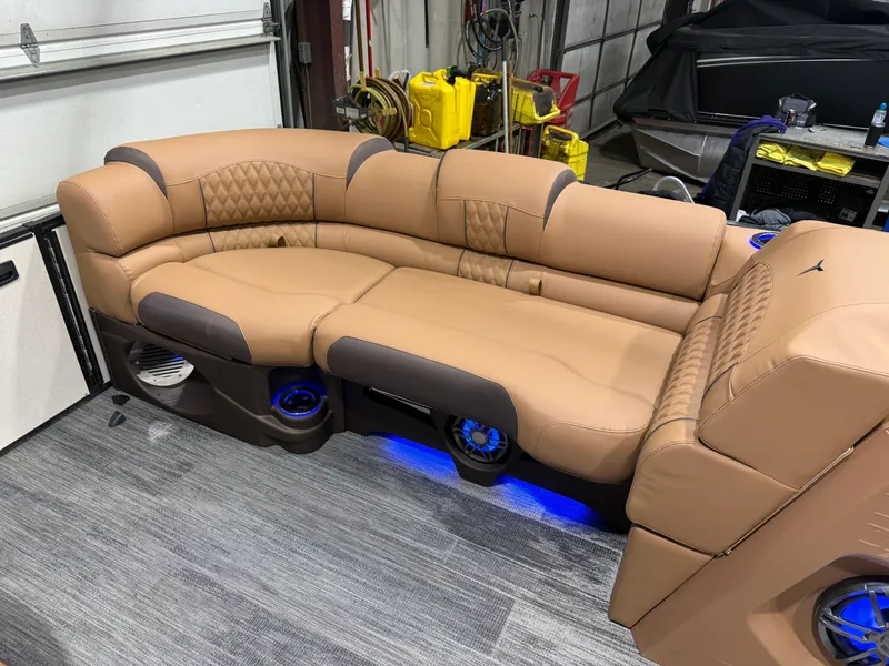 Slide: The Image of Luxurious leather seating in 2025 Tahoe Cascade 2385 Tritoon. - 32