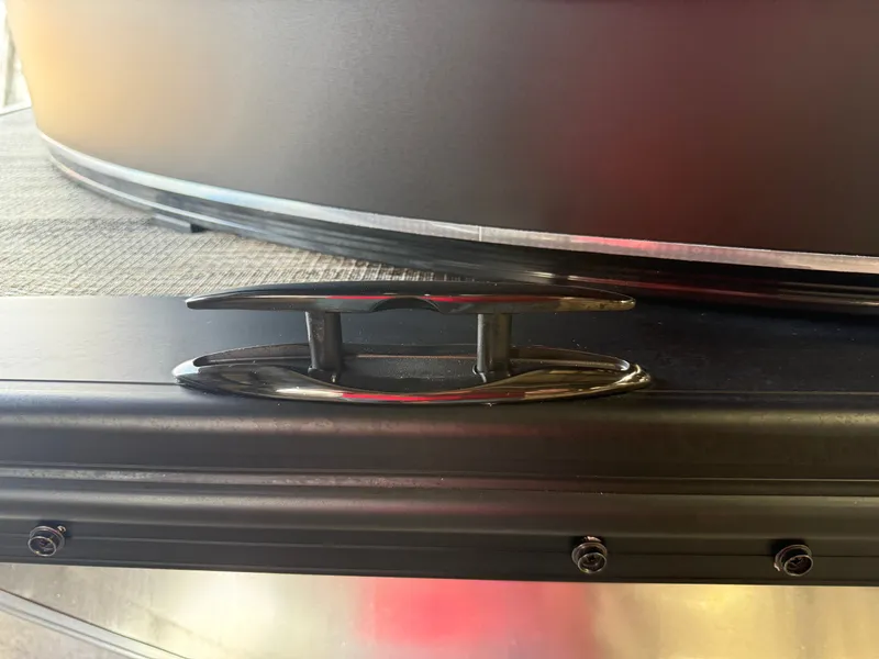 Slide: The Image of Close-up of a 2025 Tahoe Cascade 2385 Tritoon boat detail. - 42