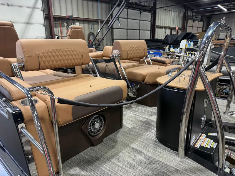 Slide: The Image of Interior of 2025 Tahoe Cascade 2385 Tritoon with luxurious seating. - 47