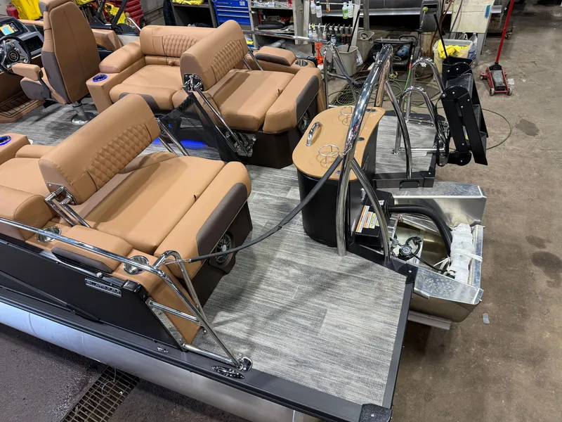 Slide: The Image of Interior of 2025 Tahoe Cascade 2385 Tritoon with luxurious seating. - 5