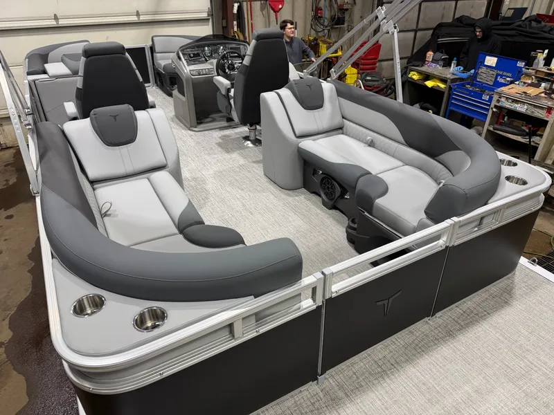 Slide: The Image of 2026 Tahoe LTZ 2385 Quad Lounge with Honda 4-Stroke EFI interior view. - 21