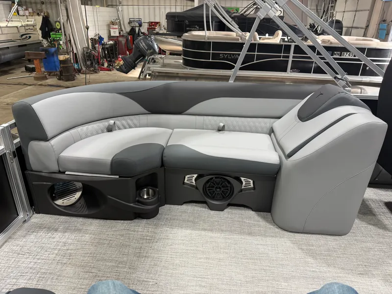 Slide: The Image of Luxurious seating in Tahoe LTZ 2385 Quad Lounge boat, 2026 model. - 23