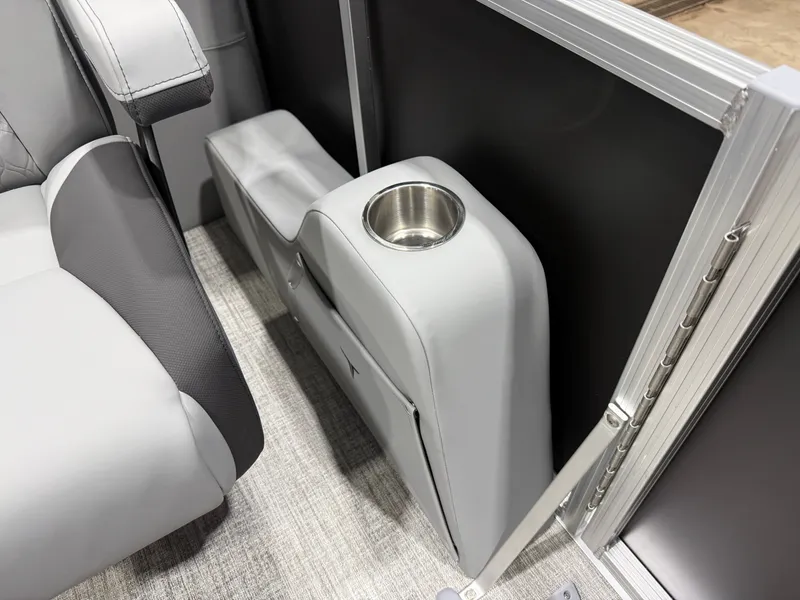 Slide: The Image of Interior of 2026 Tahoe LTZ 2385 Quad Lounge with cup holder. - 25