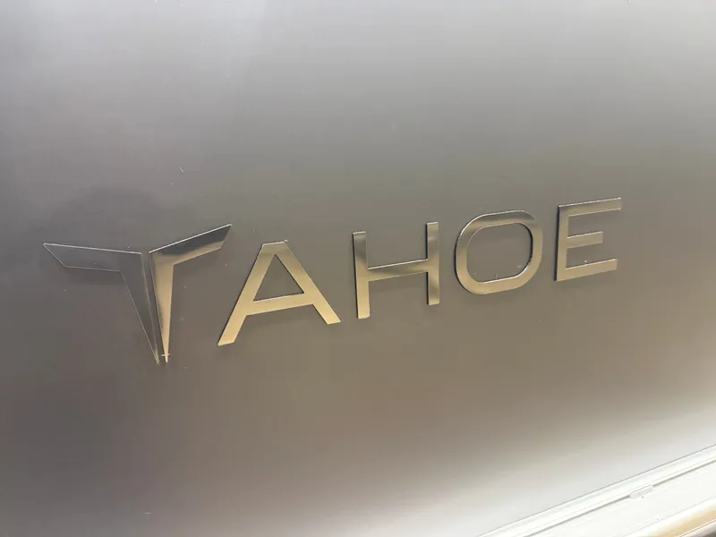 Slide: The Image of 2026 Tahoe LTZ 2385 Quad Lounge logo on gray background. - 38
