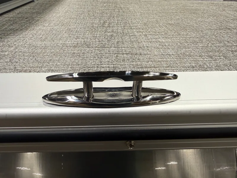 Slide: The Image of 2026 Tahoe LTZ 2385 boat cleat on carpeted deck. - 40