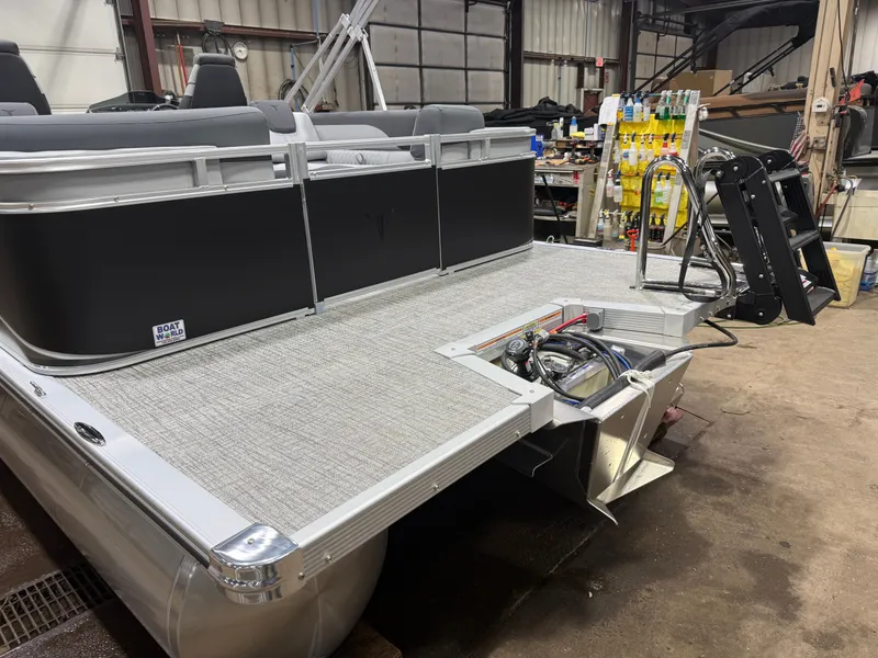 Slide: The Image of 2026 Tahoe LTZ 2385 Quad Lounge with Honda 4-Stroke EFI in workshop area. - 41