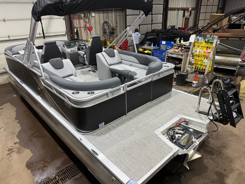Slide: The Image of 2026 Tahoe LTZ 2385 Quad Lounge pontoon boat in workshop. - 47
