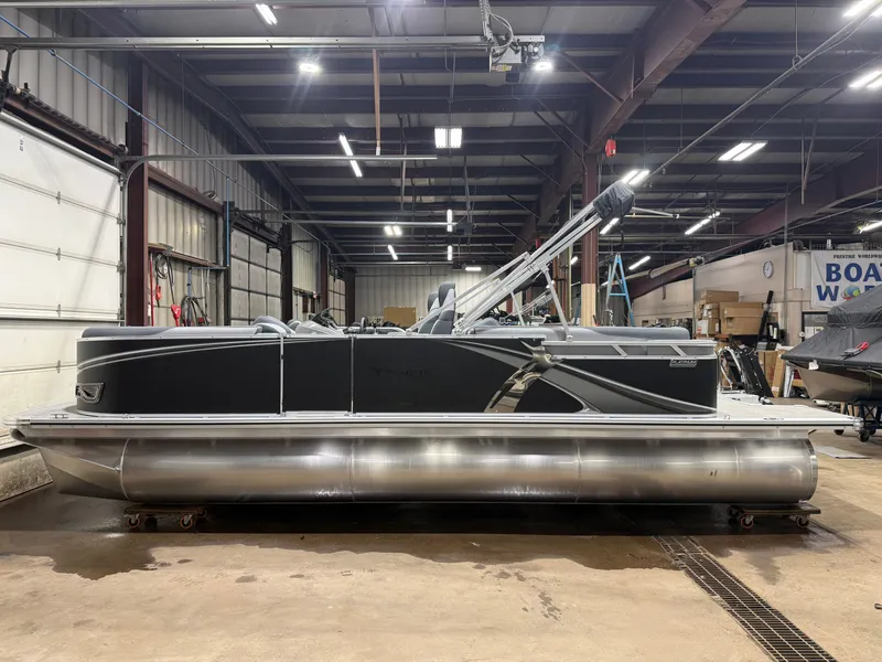 Slide: The Image of 2026 Tahoe LTZ 2385 Quad Lounge pontoon boat in warehouse. - 48
