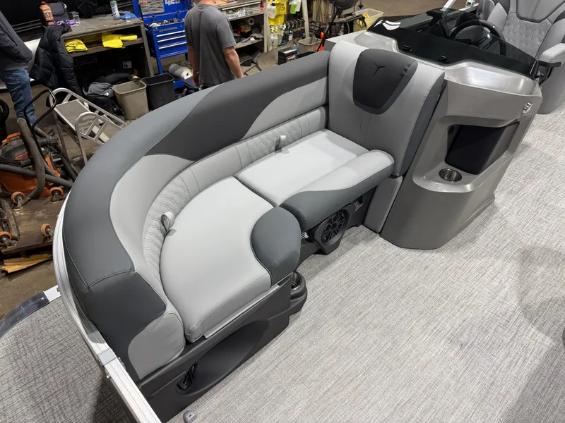 Slide: The Image of 2026 Tahoe LTZ 2385 Quad Lounge interior with gray upholstery. - 8