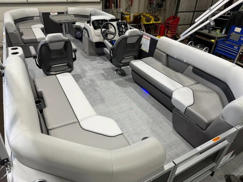 Slide: The Image of Interior of Princecraft Vectra 21 Pontoon, luxurious seating and helm, model year 2026. - 19
