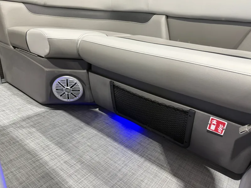Slide: The Image of Interior of Princecraft Vectra 21 Pontoon with speaker and blue lighting. - 23