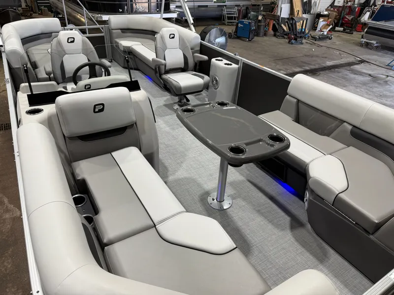 Slide: The Image of Interior of Princecraft Vectra 21 Pontoon, luxurious seating and table. - 26