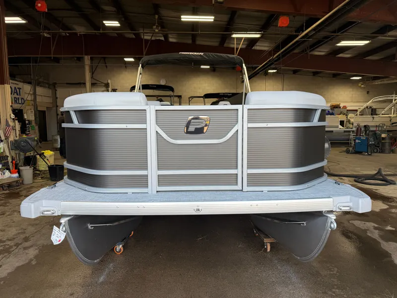 Slide: The Image of 2026 Princecraft Vectra 21 Pontoon in a workshop setting. - 27