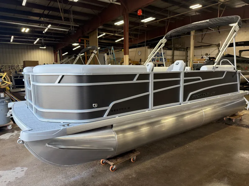 Slide: The Image of 2026 Princecraft Vectra 21 Pontoon displayed indoors. - 29