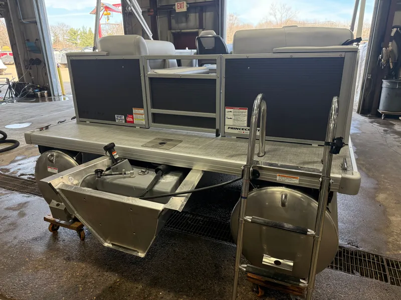 Slide: The Image of 2026 Princecraft Vectra 21 pontoon indoors with ladder. - 34