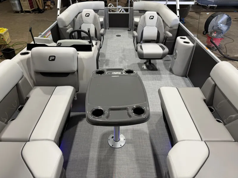 Slide: The Image of Interior of Princecraft Vectra 21 Pontoon, luxurious seating and table. - 6