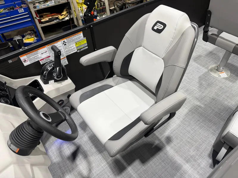 Slide: The Image of Interior of Princecraft 21 Sportfisher 2RS Pontoon, steering wheel and seat. - 11