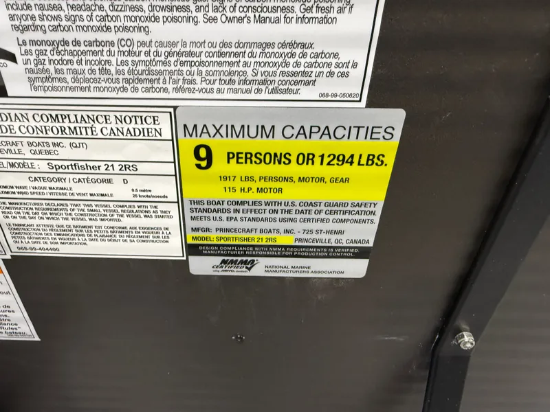 Slide: The Image of Capacity label for 9 persons or 1294 lbs on Princecraft Pontoon. - 16