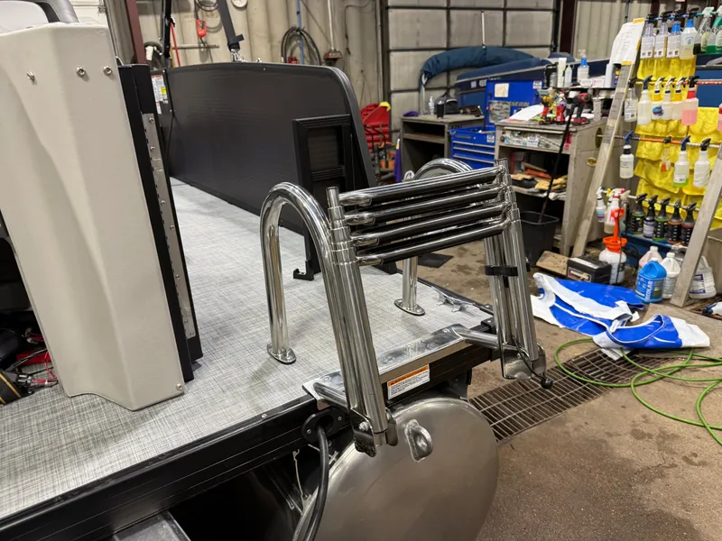 Slide: The Image of Princecraft 21 Sportfisher 2RS Pontoon with stainless steel ladder, workshop setting. - 35