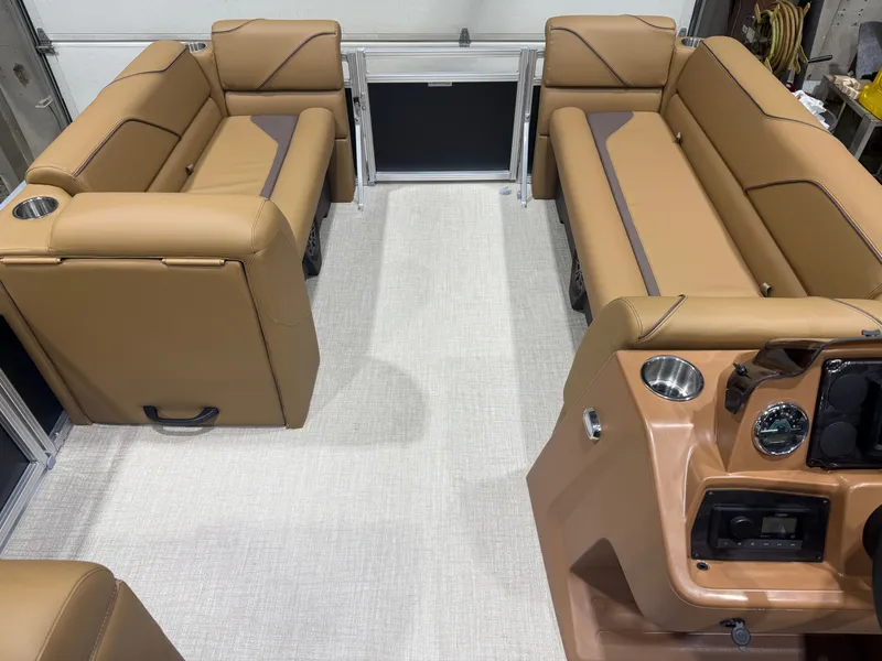 Slide: The Image of Interior of 2026 Tahoe Sport 1980 Cruise with beige leather seating. - 25
