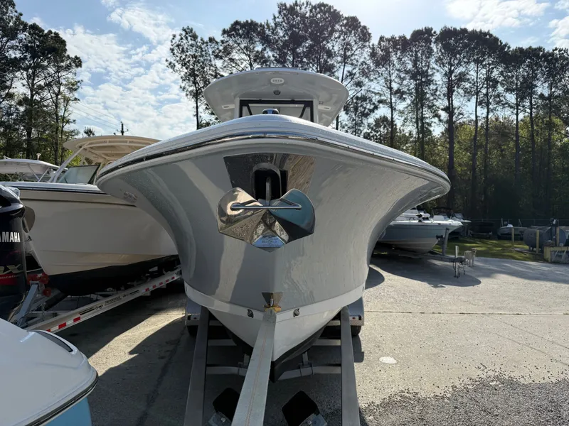 Slide: The Image of Sea Hunt Ultra 275 SE 2025 on a trailer outdoors. - 4